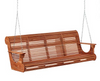 Outdoor wooden porch swing with slatted seat and back, suspended by metal chains.