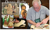 Woodcarver Dennis Bixby carving a wooden figure with chisels in workshop surrounded by caricature carvings.