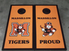Custom painted cornhole boards featuring Massillon Tigers mascot and text Massillon Tigers Proud in orange and black colors